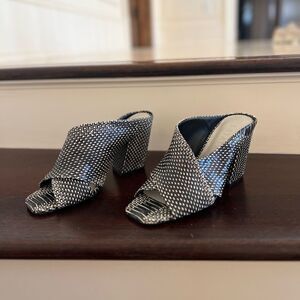 Black and white snakeskin textured slip on heels